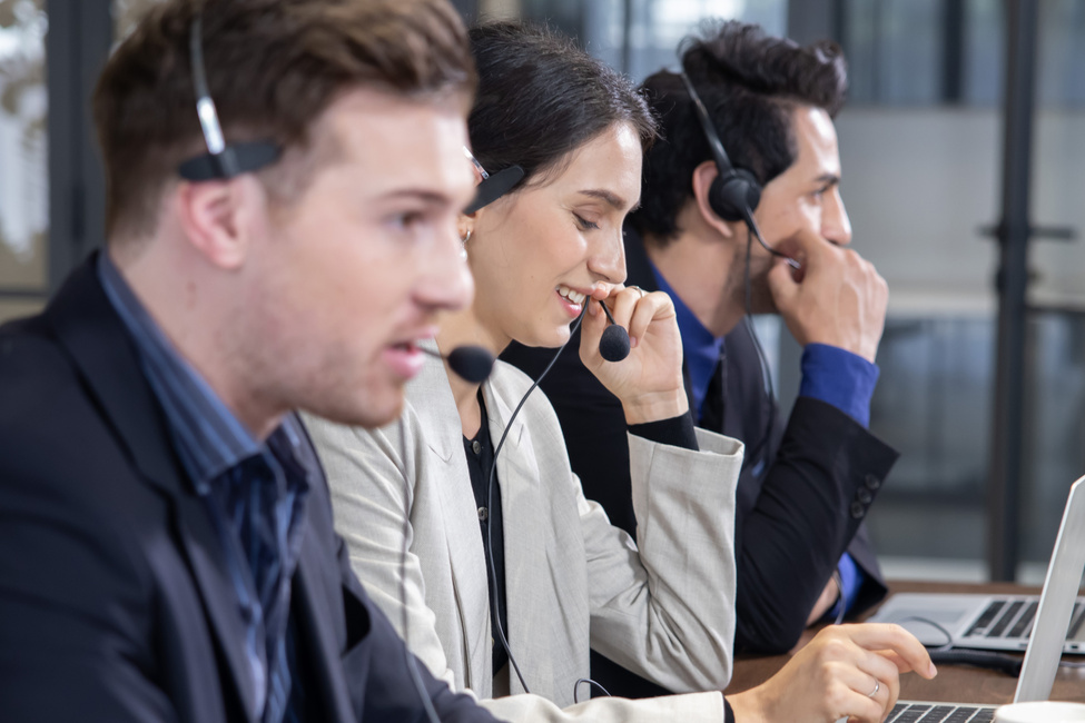 Telemarketing Colleagues with Headset 